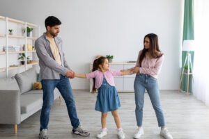 Parents trying to convince their child to go with them