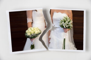Torn photograph of a lesbian couple at their wedding